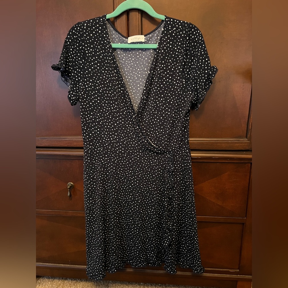 Ruffle sleeve faux wrap dress. Never worn